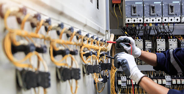 Professional Electrician technician working in Morganville, NJ